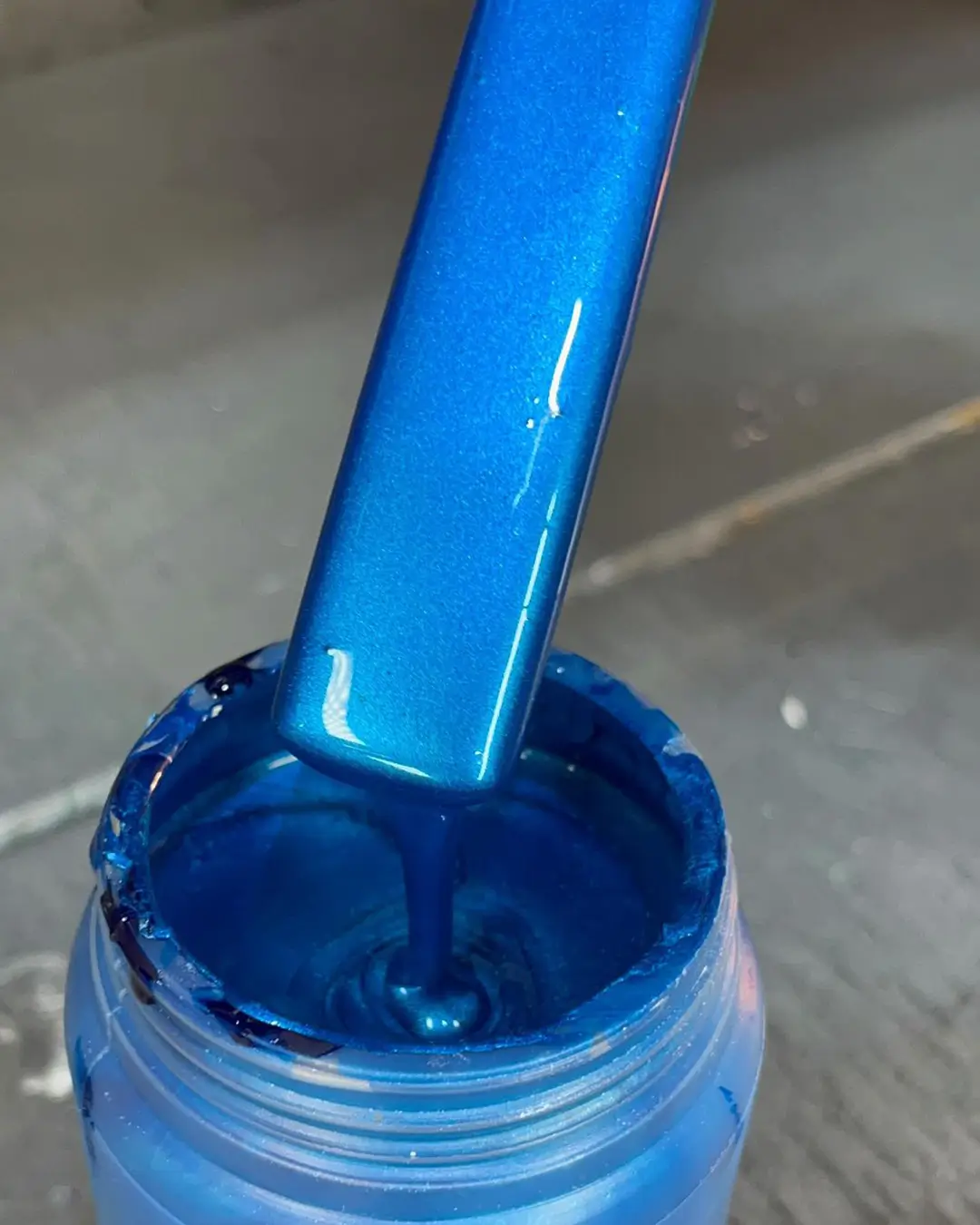 1703742318 Unleash Brilliance Mastering the Art of Metallic Blue Automotive Paint